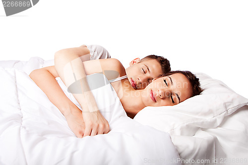 Image of Couple happy asleep in bed