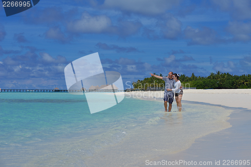Image of happy young couple have fun on summer