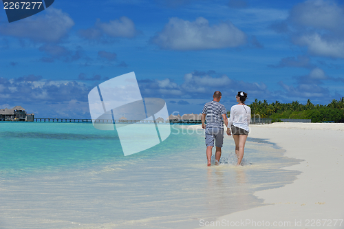 Image of happy young couple have fun on summer