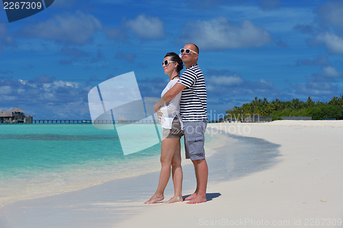 Image of happy young couple have fun on summer