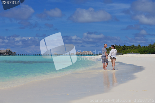 Image of happy young couple have fun on summer