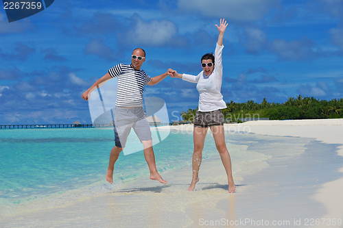 Image of happy young couple have fun on summer