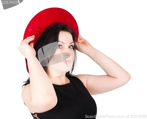 Image of young beautiful woman with red hat
