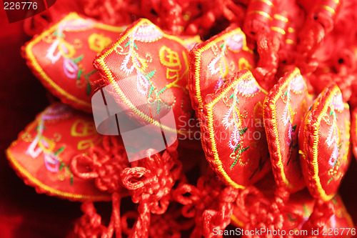 Image of Red Chinese crafts made from embroidered fabric