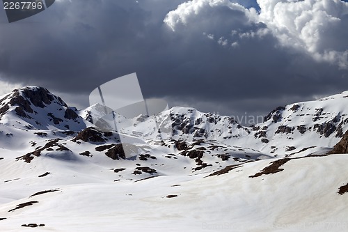 Image of Snowy mountains in clouds
