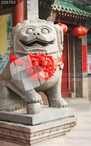 Image of Statue decorated for Chinese New Year