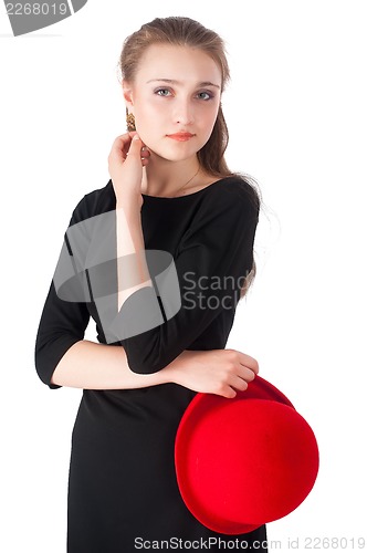 Image of young beautiful woman with red hat