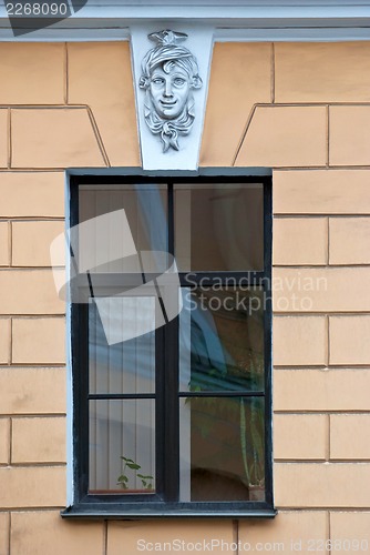 Image of A window with a bas-relief.