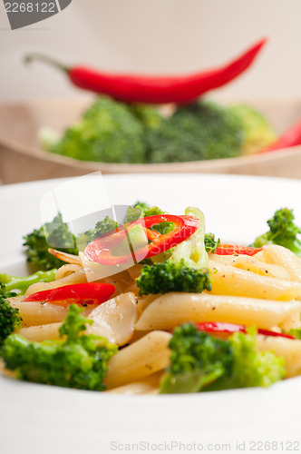 Image of Italian penne pasta with broccoli and chili pepper