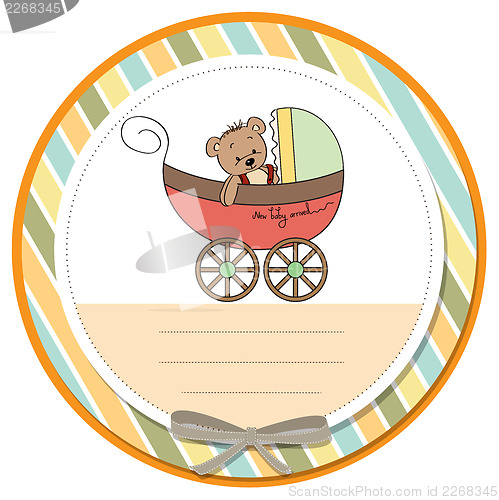 Image of funny teddy bear in stroller