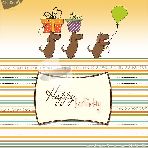 Image of three dogs that offer a big gift. birthday greeting card