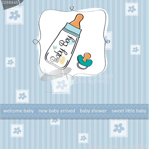 Image of baby announcement card with milk bottle and pacifier