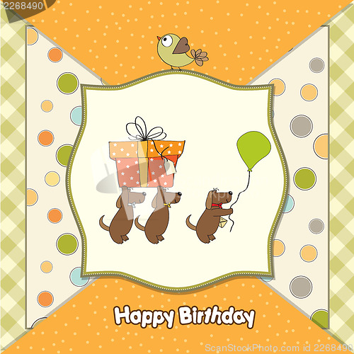 Image of three dogs that offer a big gift. birthday greeting card