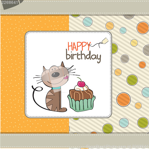 Image of birthday greeting card with a cat waiting to eat a cake