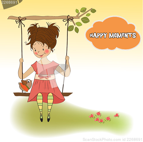 Image of young girl in a swing