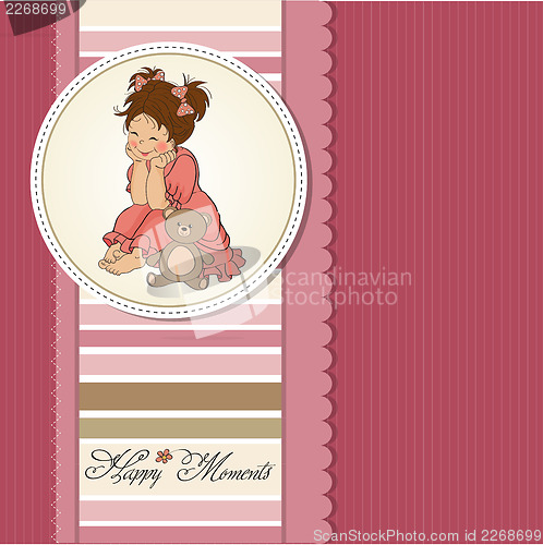 Image of little baby girl play with her teddy bear toy