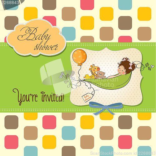 Image of little girl siting in a pea been. baby announcement card