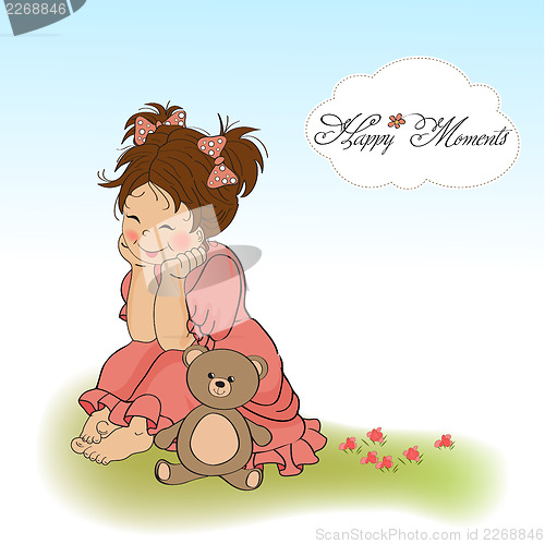 Image of little baby girl play with her teddy bear toy