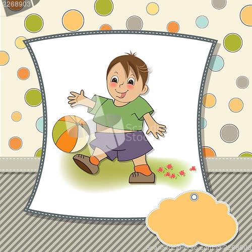 Image of little boy playing ball