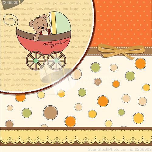 Image of funny teddy bear in stroller