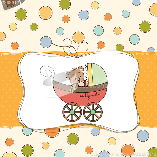 Image of funny teddy bear in stroller