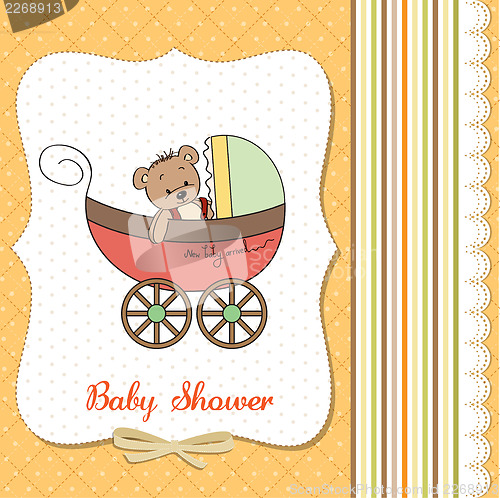 Image of funny teddy bear in stroller, baby announcement card
