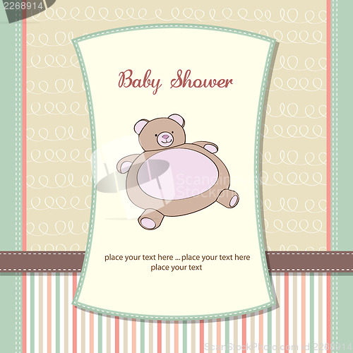 Image of baby shower card with teddy bear toy