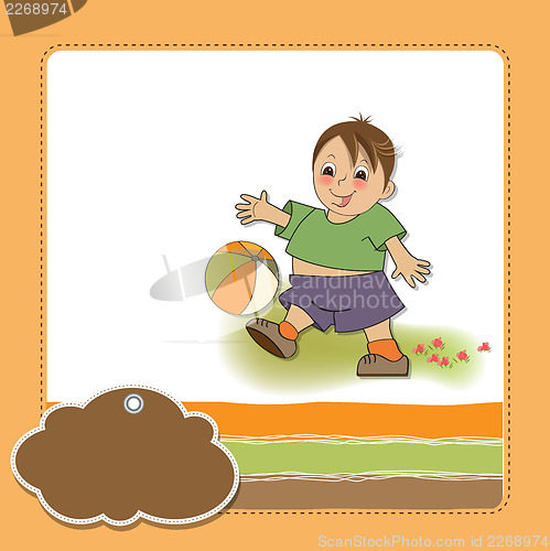 Image of little boy playing ball