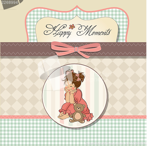 Image of little baby girl play with her teddy bear toy