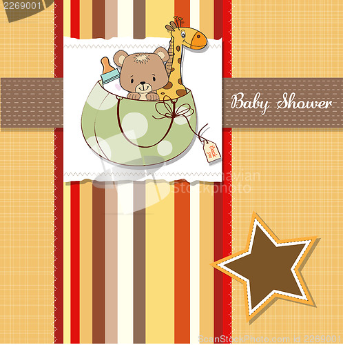 Image of new baby announcement card with bag and same toys