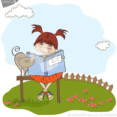 Image of young sweet girl reading a book