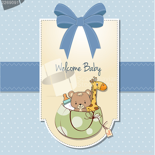 Image of new baby announcement card with bag and same toys