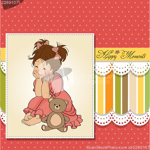 Image of little baby girl play with her teddy bear toy