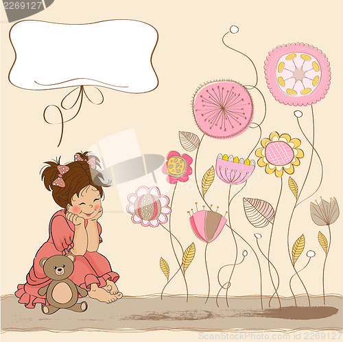 Image of little baby girl play with her teddy bear toy
