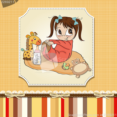 Image of little baby girl play with her toys