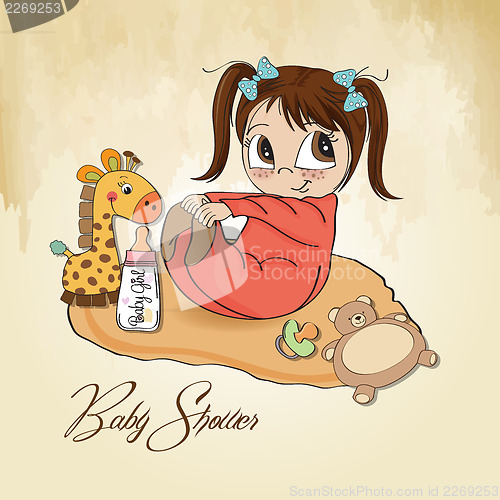 Image of little baby girl play with her toys