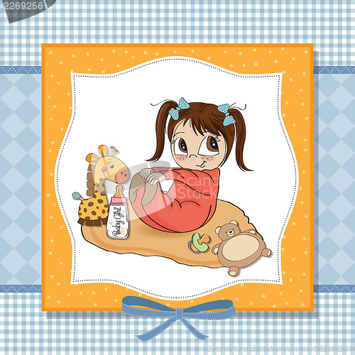 Image of little baby girl play with her toys
