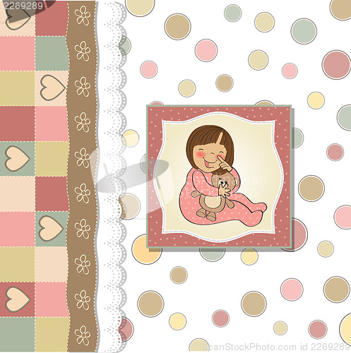 Image of little baby girl play with her teddy bear toy