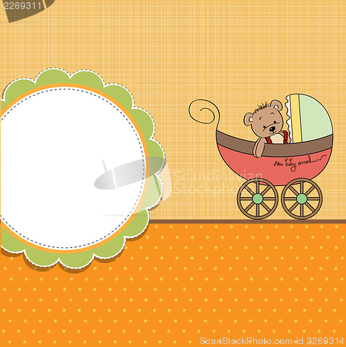 Image of funny teddy bear in stroller