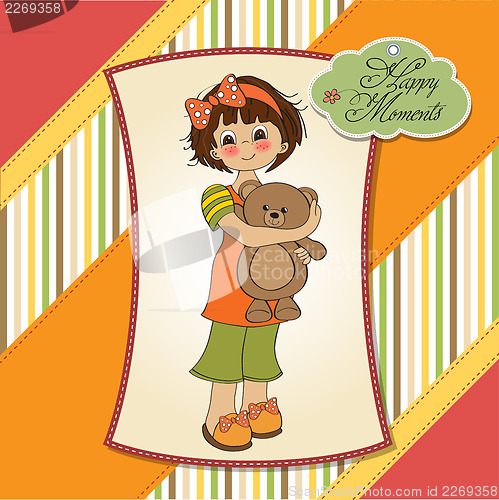 Image of young girl going to sleep with her favorite toy, a teddy bear