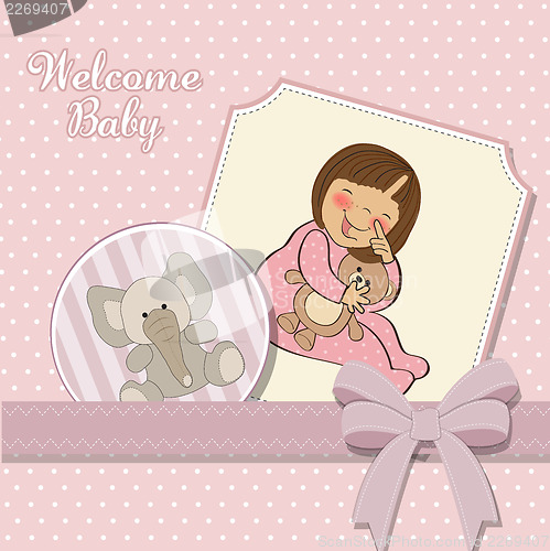 Image of little baby girl with her teddy bear toy