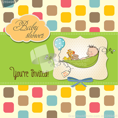 Image of little boy sleeping in a pea been, baby shower card