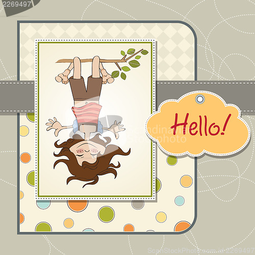 Image of amused young girl standing with her head hanging down