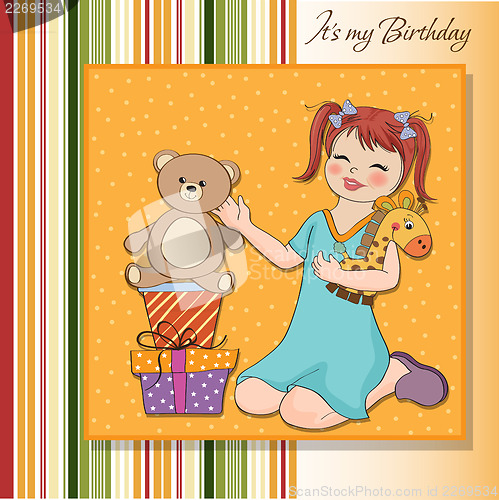 Image of little girl playing with her birthday gifts . happy birthday car