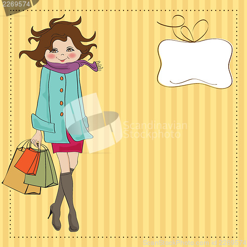 Image of beautiful young woman at shopping