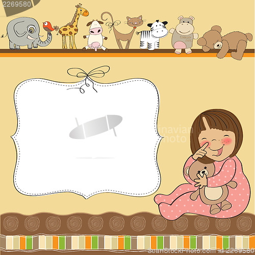 Image of new baby girl announcement card with girl and her toy