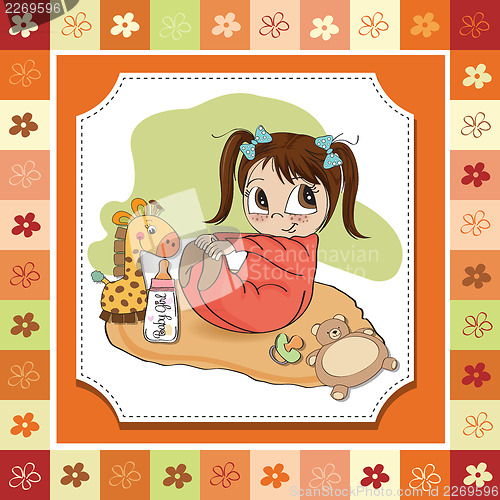 Image of little baby girl play with her toys