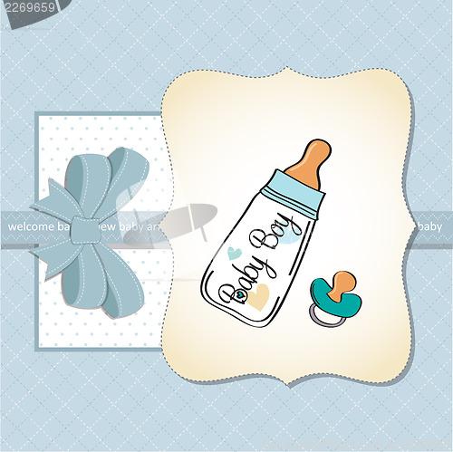 Image of baby announcement card with milk bottle and pacifier
