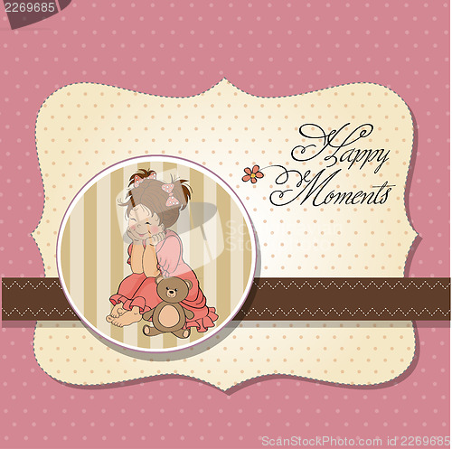 Image of little baby girl play with her teddy bear toy