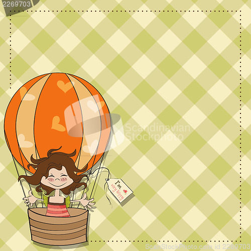 Image of happy girl flying with a balloon flying